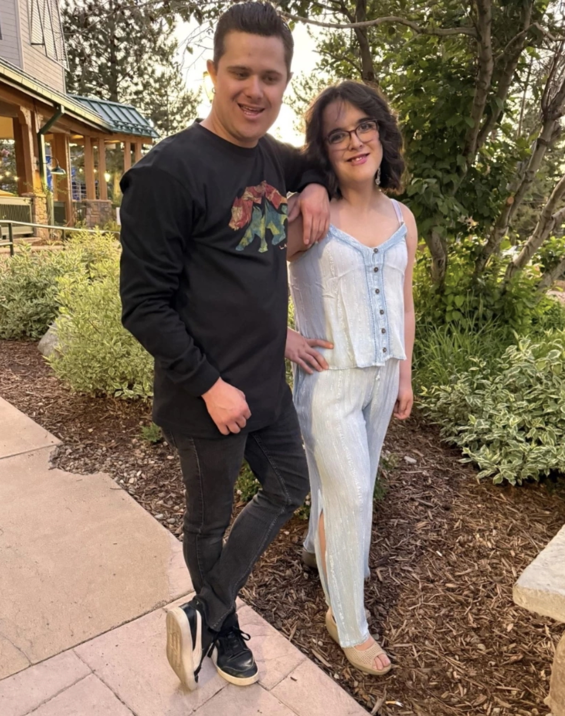 Emily and Shaylan smiling together outdoors